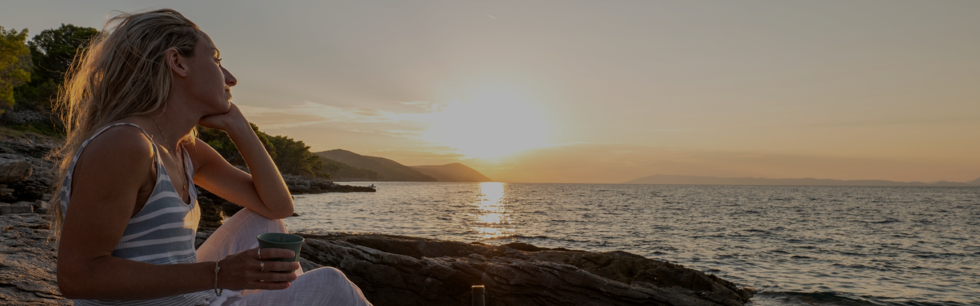 Woman-at-Sunset-1920x600-1