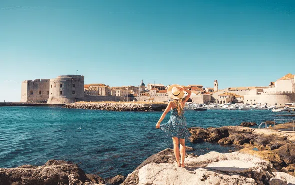 Woman looking at Dubrovnik